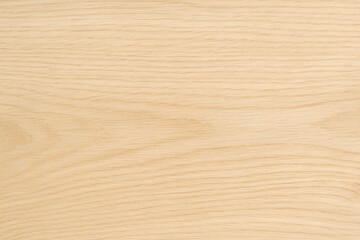 Wooden Elegance: A close-up view showcases the intricate grain and texture of a smooth, light-colored wooden surface, inviting touch and admiration.