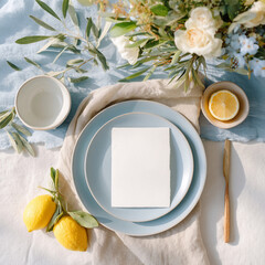 Elegant Table Setting with Floral Arrangement and Blank Card