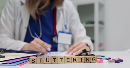 Female doctor makes notes writing prescriptions for Stuttering treatment in clinical office. Patient care and effective communication strategies
