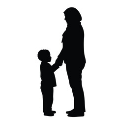 Silhouette of a mother holding her child's hand showing love and parental guidance