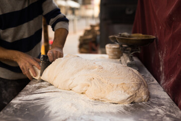 Yeast dough on baking table. cooking process
