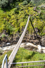 Suspension pedestrian bridge of the Barca da Amieira walkways in Amieira do Tejo, Portugal.