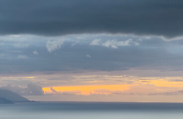 Sunset sky. Dramatic sky view. Sunlight over the sea