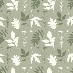 Textile pattern with silhouette leaves on soft green background. Vector illustration