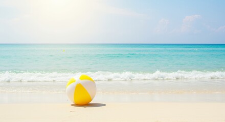Obraz premium Beach Ball on Sand at Tropical Sea