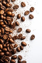 Roasted coffee beans and ground coffee scattered on white background