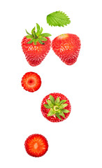 fresh strawberries and slices on white background.