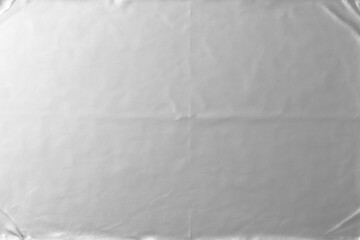 Wrinkled silver foil texture. Silver paper design overlay, abstract backgrounds.
