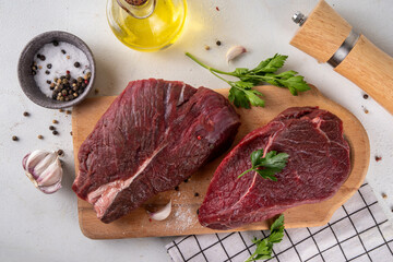 Raw beef meat steaks ready for cooking grilling