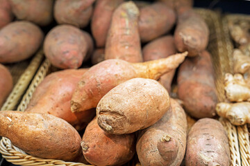 ripe sweet potato in a container in the supermarket. Healthy food