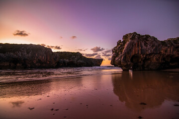 playa con puesta de sol