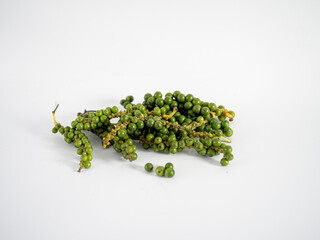 Pepper sprigs arranged asymmetrically with motion-like shape, implying freshness, energy, and...