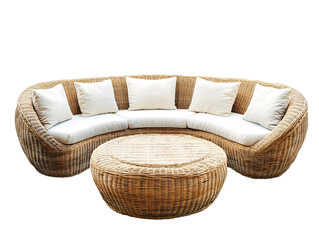 a round wicker couch with white pillows