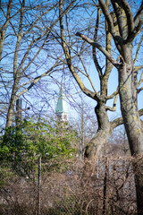 Scenic View of Church, Houses, Streets, and Trees in Denmark