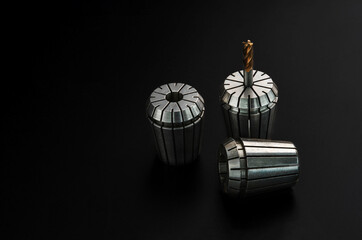 endmill carbide in collet for cnc lathe and milling isolate on black background cutting tool concept.