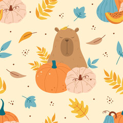Obraz premium Funny capybara with pumpkins autumn pattern