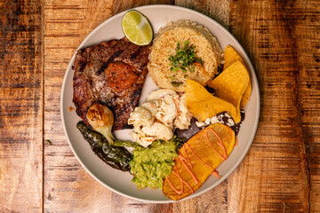 Grilled steak with vegetables and rice