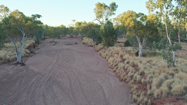 Sideways footage across the dry dry Todd River. Alice Springs, Mparntwe, Northern Territory, Australia. August 2022.