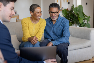 Warm Couple Interacting with Financial Consultant