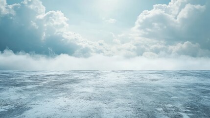Obraz premium Vast, empty concrete expanse beneath a cloudy sky.