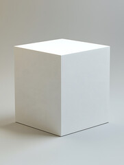 Naklejka premium Geometric white cube positioned on a pale surface showcasing clean lines and subtle shadows a simple minimalist composition.