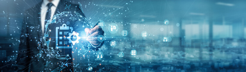 Hand of businessman drawing graphs Project Management is the application of processes, skills, and knowledge to plan, execute, complete projects on time. It ensures resource use and goal achievement.
