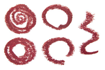Set of circles drawn with pink lip pencil on an empty background.