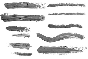 Set of gray smears with a pencil on an empty background.