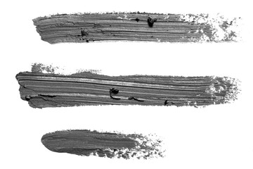 Gray lines and smears drawn with a pencil on an empty background.