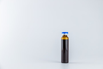 Oral liquid medical drugs on a grey background
