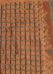 Drag mat top view on the tennis surface of artificial clay