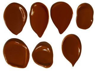 Set of dark-colored foundation cream on an empty background.
