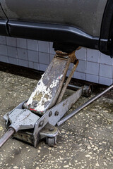 Closeup photo shoot of different nesessary tools and parts in every man's garage.Auto check up and car service shop concept.Different type of tools, especially wrenches.