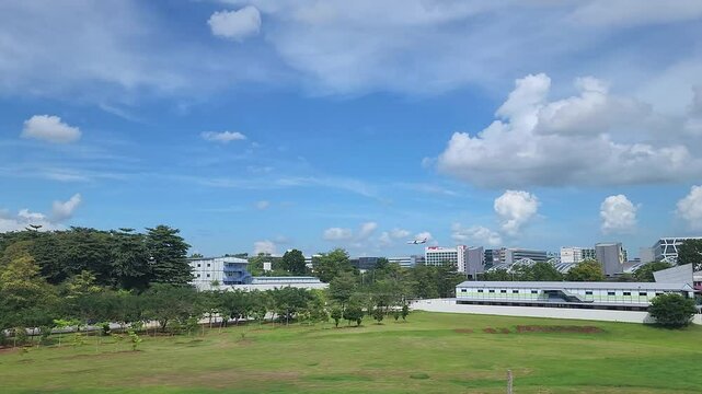 The train passed by Changi Business Park, Singapore.