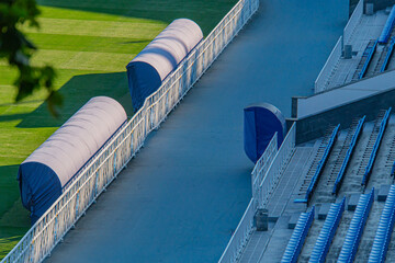 Aerial view of an empty stadium with honeycomb seating arrangement, suggestive of either pre or...