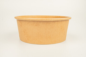 Off-white, round cardboard container suitable for small items shipping or packaging with a flat base