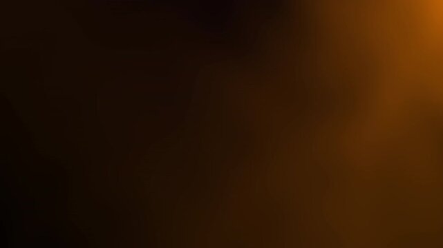 A warm brown gradient abstract background with soft transitions and no distinct objects or figures.