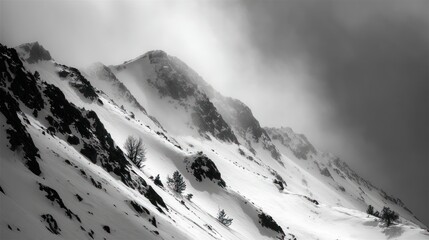 Majestic Snowy Mountain Landscape Shrouded in Mysterious Fog