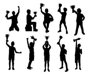silhouette of a child carrying a winning trophy