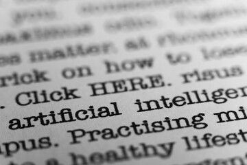 Artificial intelligence. Text printed on a page. A piece of paper with a phrase written in retro typewriter font