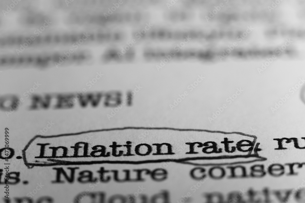 Fototapete inflation rate. text printed on a page. a piece of paper with a phrase written in retro typewriter f