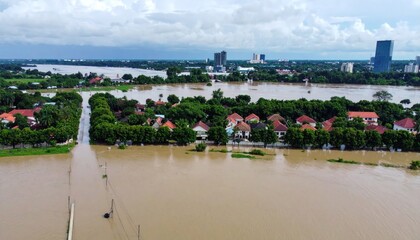 Devastating Flooding Grips Suburban Neighborhood and Distant Cityscape