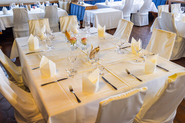 Elegant table setting waiting for guests in luxury restaurant