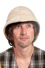 Exploring traditions while wearing a unique vintage helmet in a playful way