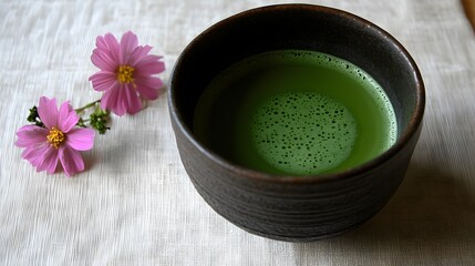 Serene Matcha Tea in Rustic Bowl with Cosmos Flowers