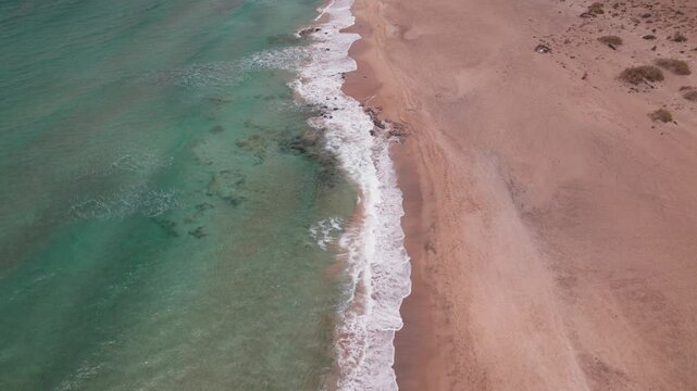 Top Down Drone Shot of Playa Mallorquines with Parasailer Below, Fu