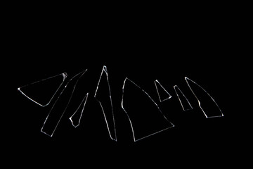 sharp edged shards of glass, back background