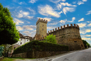Vigoleno Castle medieval fortress stone tower blue sky historic architecture Italy.