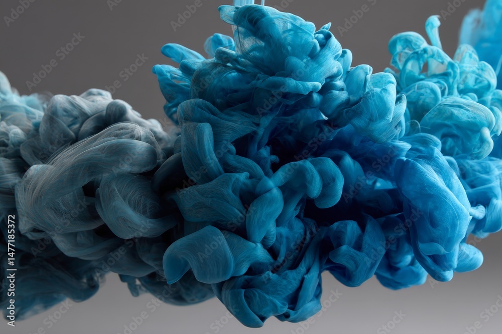 Poster colorful swirls of blue and teal ink mixing in water create a mesmerizing abstract design