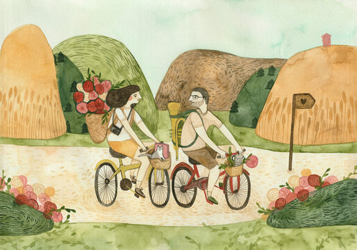 A couple riding bicycles together in the middle of mountains